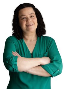 Smiling female voice actor with arms crossed